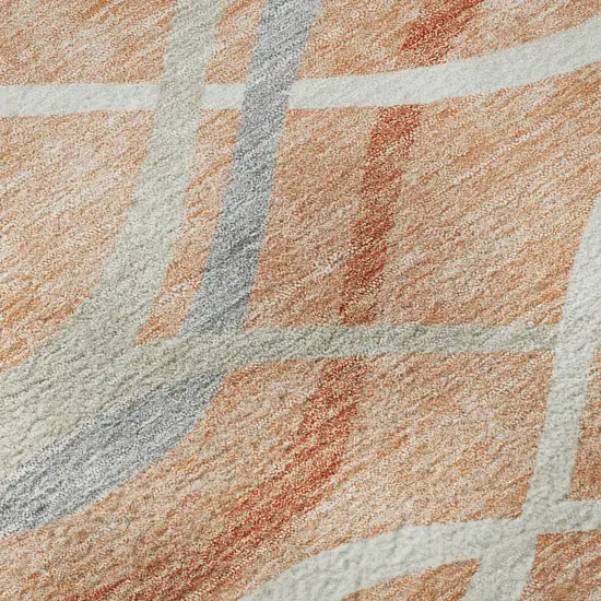 8' Peach Gray And Ivory Abstract Washable Round Rug With UV Protection Photo 8