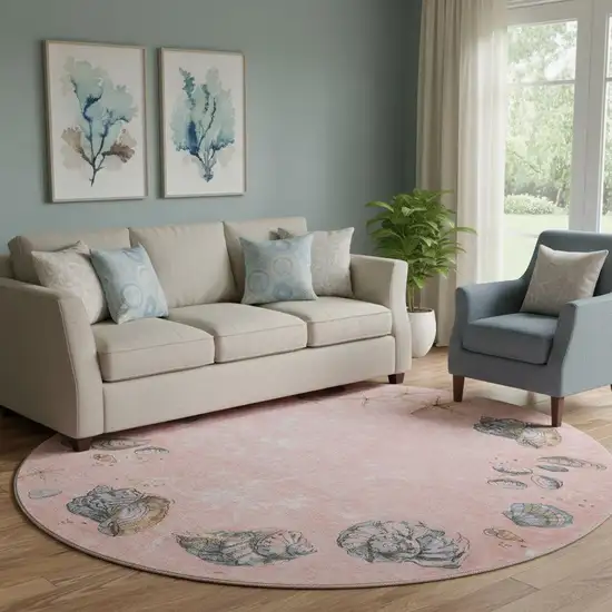 8' Peach Gray And Ivory Geometric Washable Round Rug With UV Protection Photo 1