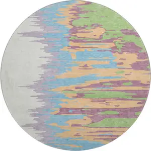 Photo of 8' Peach Green And Blue Abstract Washable Round Rug With UV Protection