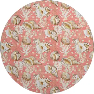 Photo of 8' Peach Ivory And Beige Geometric Washable Round Rug With UV Protection