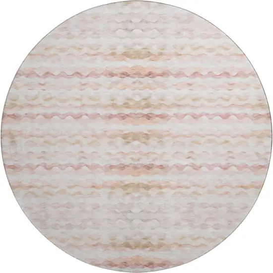 8' Peach Ivory And Beige Geometric Washable Round Rug With UV Protection Photo 1