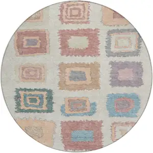 Photo of 8' Peach Ivory And Beige Round Geometric Washable Indoor Outdoor Area Rug