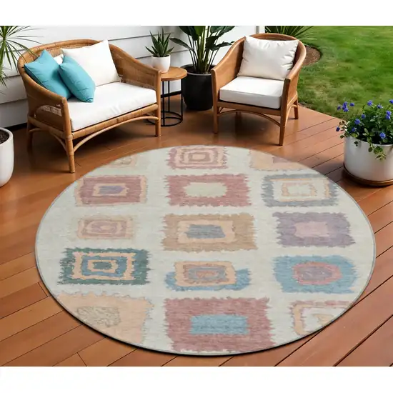 8' Peach Ivory And Beige Round Geometric Washable Indoor Outdoor Area Rug Photo 2