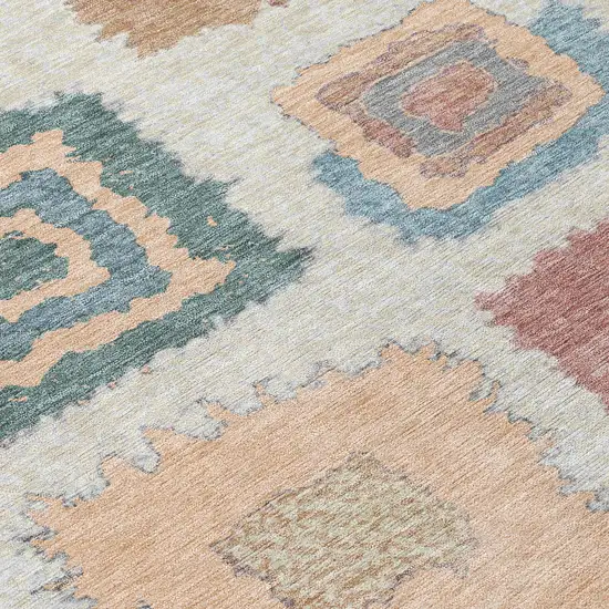 8' Peach Ivory And Beige Round Geometric Washable Indoor Outdoor Area Rug Photo 8