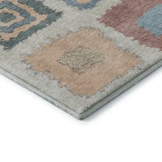 8' Peach Ivory And Blue Geometric Washable Round Rug With UV Protection Photo 7