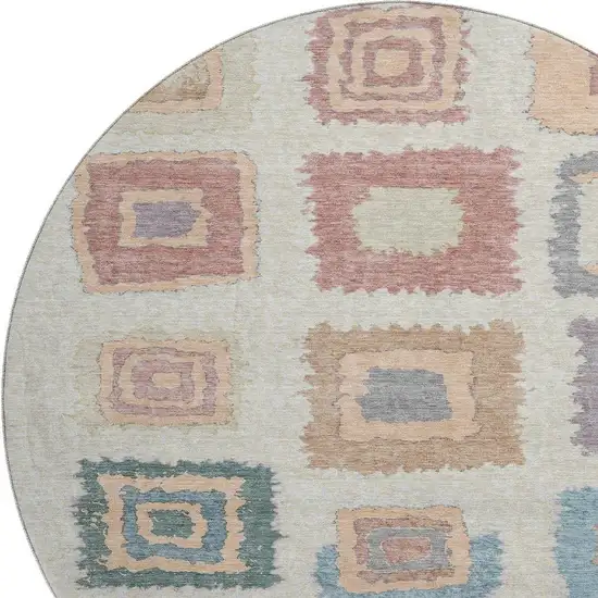 8' Peach Ivory And Blue Geometric Washable Round Rug With UV Protection Photo 3