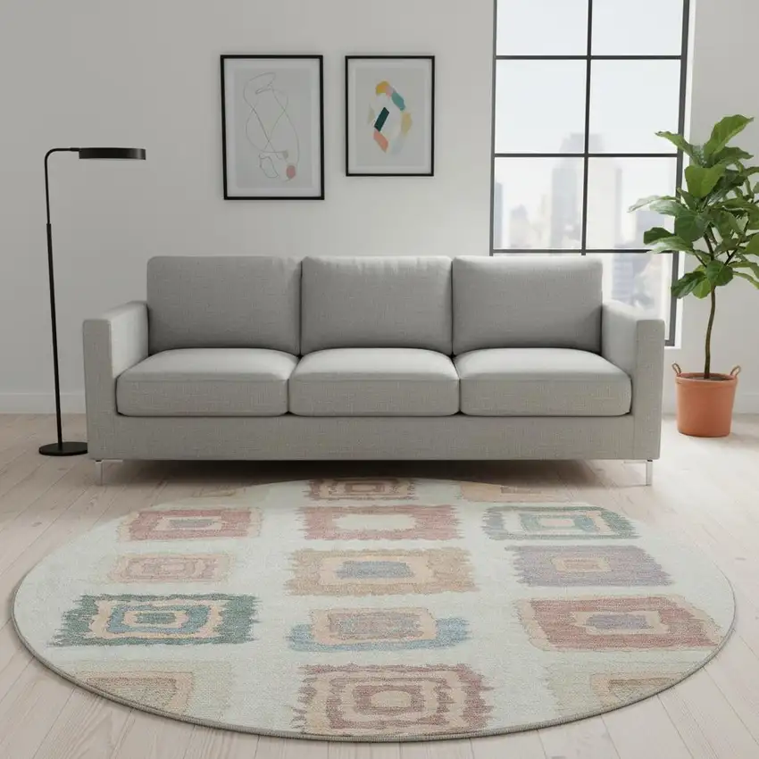 8' Peach Ivory And Blue Geometric Washable Round Rug With UV Protection Photo 2