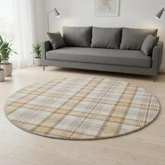 8' Peach Ivory And Brown Plaid Washable Round Rug With UV Protection Photo 2