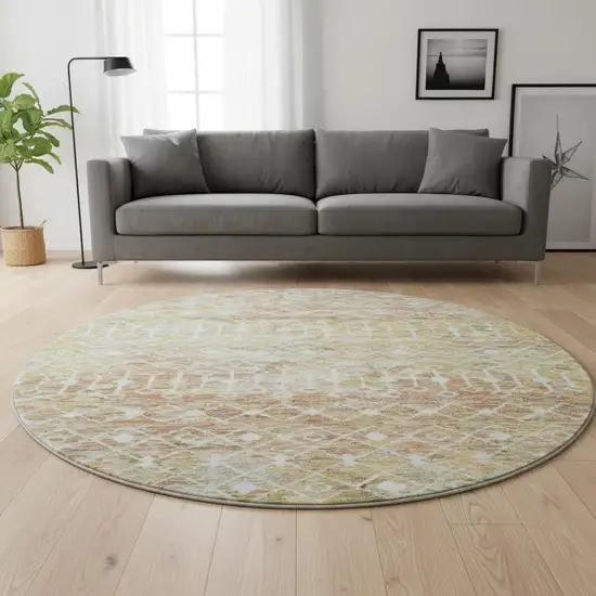8' Peach Ivory And Gold Geometric Washable Round Rug With UV Protection Photo 2