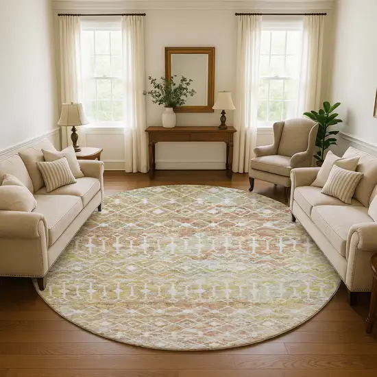 8' Peach Ivory And Gold Geometric Washable Round Rug With UV Protection Photo 4