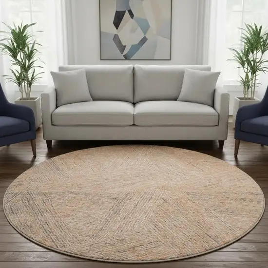 8' Peach Ivory And Gray Abstract Washable Round Rug With UV Protection Photo 2