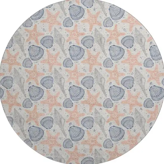 8' Peach Ivory And Navy Blue Geometric Washable Round Rug With UV Protection Photo 4