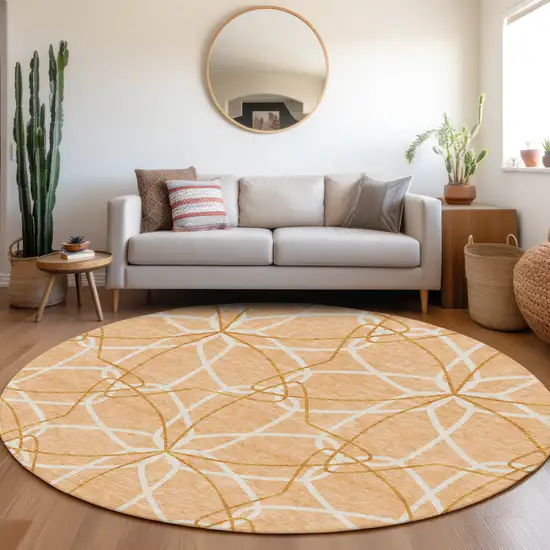 8' Peach Ivory And Orange Geometric Washable Round Rug With UV Protection Photo 4