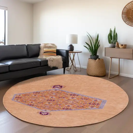 8' Peach Orange And Beige Oriental Washable Round Rug With UV Protection Photo 4