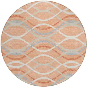 Photo of 8' Peach Orange And Gray Round Abstract Washable Indoor Outdoor Area Rug