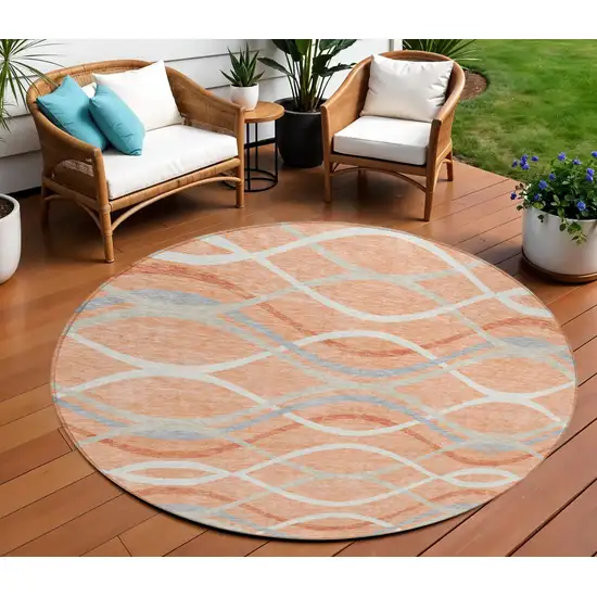 8' Peach Orange And Gray Round Abstract Washable Indoor Outdoor Area Rug Photo 1