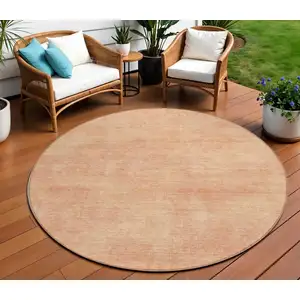 Photo of 8' Peach Round Washable Indoor Outdoor Area Rug