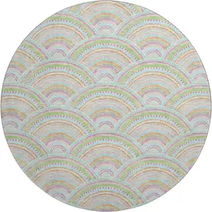 Photo of 8' Pearl Orange And Green Geometric Washable Round Rug With UV Protection