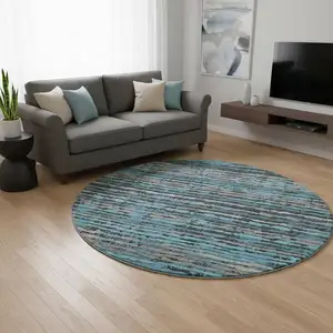 Photo of 8' Persian Blue And Charcoal Striped Washable Round Rug With UV Protection