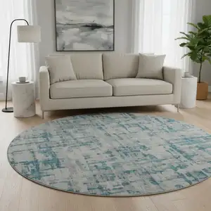 Photo of 8' Persian Blue And Gray Abstract Washable Round Rug With UV Protection