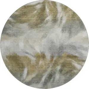 Photo of 8' Pewter And Gold Abstract Washable Round Rug With UV Protection