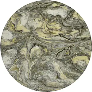 Photo of 8' Pewter And Gold Round Abstract Washable Indoor Outdoor Area Rug