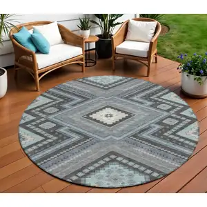 Photo of 8' Pewter Charcoal And Sky Blue Round Tribal Washable Indoor Outdoor Area Rug