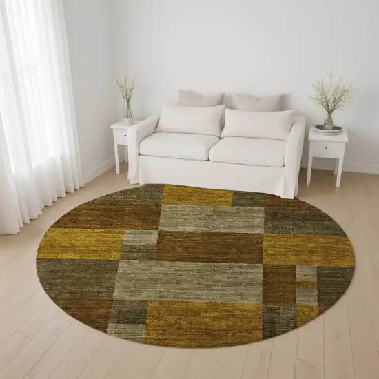 8' Pewter Gold And Brown Geometric Washable Round Rug With UV Protection Photo 4