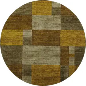 Photo of 8' Pewter Gold And Brown Geometric Washable Round Rug With UV Protection