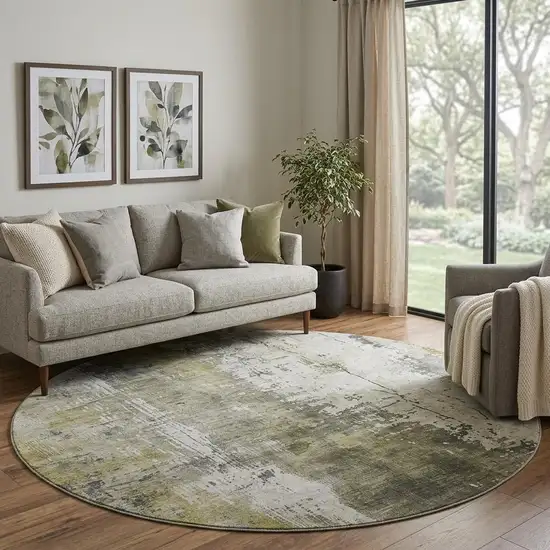 8' Pewter Gold And Ivory Abstract Washable Round Rug With UV Protection Photo 1