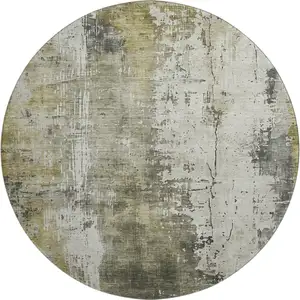 Photo of 8' Pewter Gold And Ivory Abstract Washable Round Rug With UV Protection