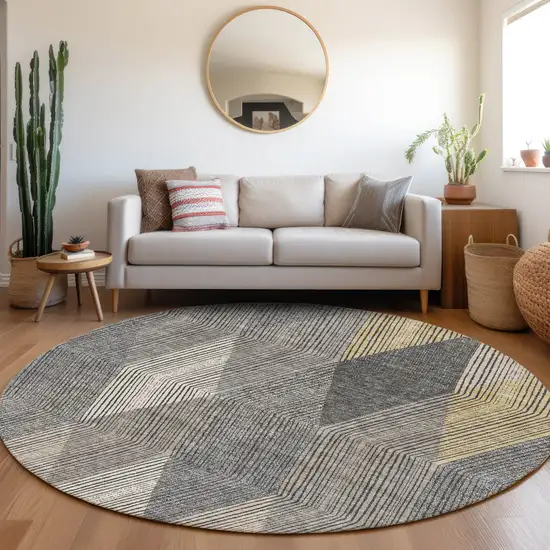 8' Pewter Gold And Ivory Geometric Washable Round Rug With UV Protection Photo 4
