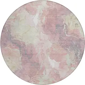 Photo of 8' Pink And Beige Round Abstract Washable Indoor Outdoor Area Rug