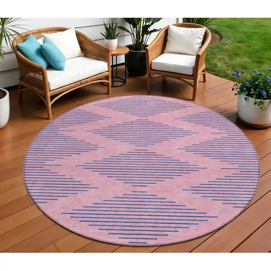 8' Pink And Blue Round Geometric Washable Indoor Outdoor Area Rug Photo 1