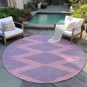 Photo of 8' Pink And Blue Round Geometric Washable Indoor Outdoor Area Rug