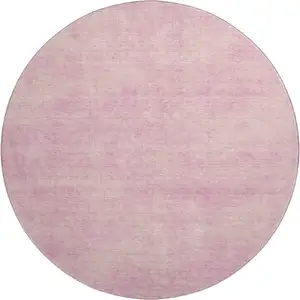 Photo of 8' Pink And Blush Abstract Washable Round Rug With UV Protection