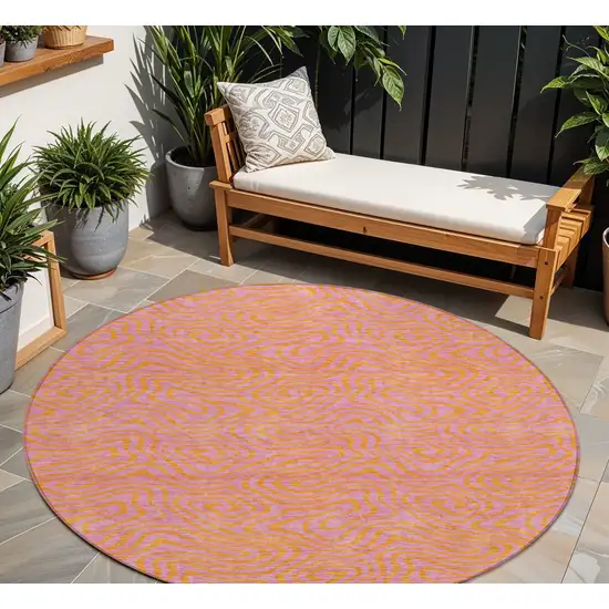 8' Pink And Copper Round Abstract Washable Indoor Outdoor Area Rug Photo 1