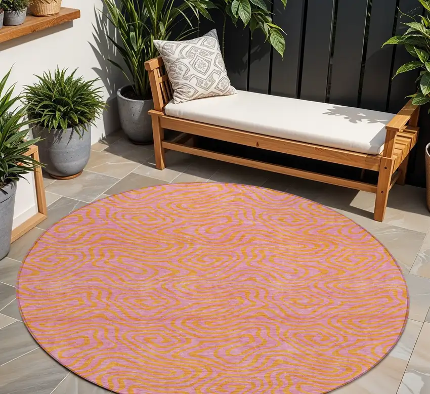 8' Pink And Copper Round Abstract Washable Indoor Outdoor Area Rug Photo 1