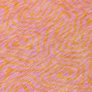 Photo of 8' Pink And Copper Round Abstract Washable Indoor Outdoor Area Rug