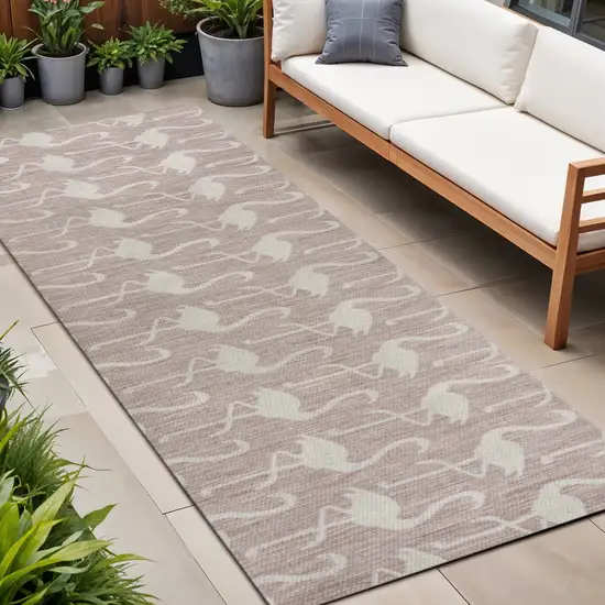 8' Pink And Cream Animal Print Indoor Outdoor Runner Rug Photo 1