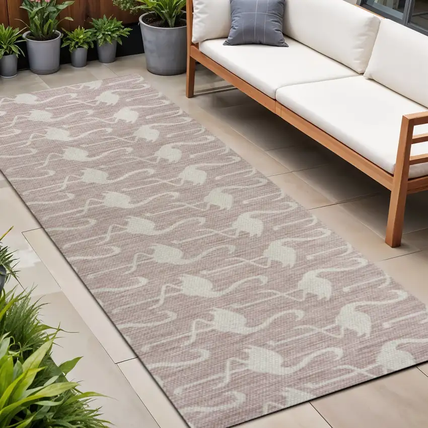 8' Pink And Cream Animal Print Indoor Outdoor Runner Rug Photo 1