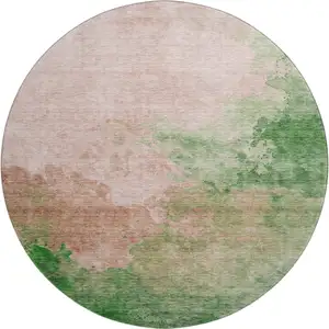 Photo of 8' Pink And Emerald Abstract Washable Round Rug With UV Protection