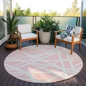 Photo of 8' Pink And Gray Round Geometric Washable Indoor Outdoor Area Rug