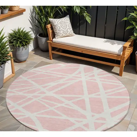 8' Pink And Gray Round Geometric Washable Indoor Outdoor Area Rug Photo 1