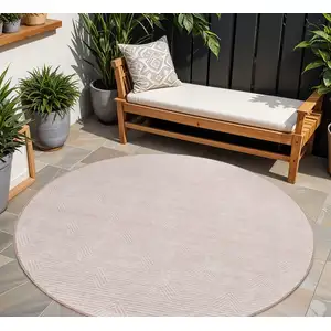 Photo of 8' Pink And Gray Round Geometric Washable Indoor Outdoor Area Rug