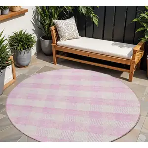 Photo of 8' Pink And Gray Round Plaid Washable Indoor Outdoor Area Rug