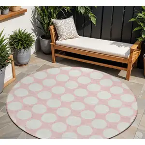Photo of 8' Pink And Gray Round Polka Dot Washable Indoor Outdoor Area Rug