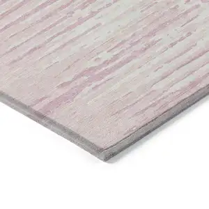 Photo of 8' Pink And Gray Round Striped Washable Indoor Outdoor Area Rug
