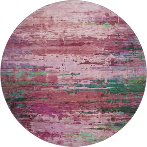 Photo of 8' Pink And Green Abstract Washable Round Rug With UV Protection