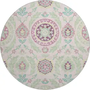 Photo of 8' Pink And Green Floral Washable Round Rug With UV Protection